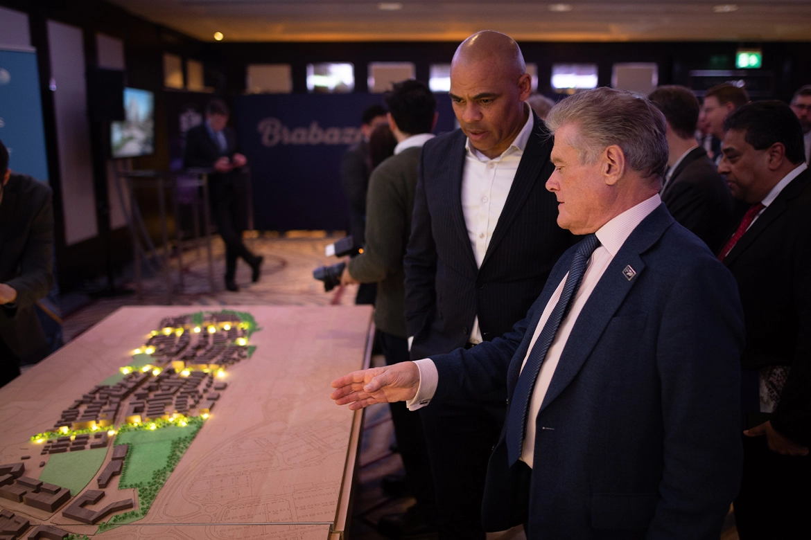 Colin Skellett looking at a scale model of the new town Brabazon